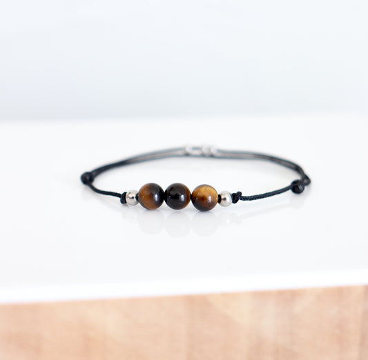 Bracelet trois perles rondes oeil de tigre sur cordon noir, bracelet fin réglable pour femme style minimaliste